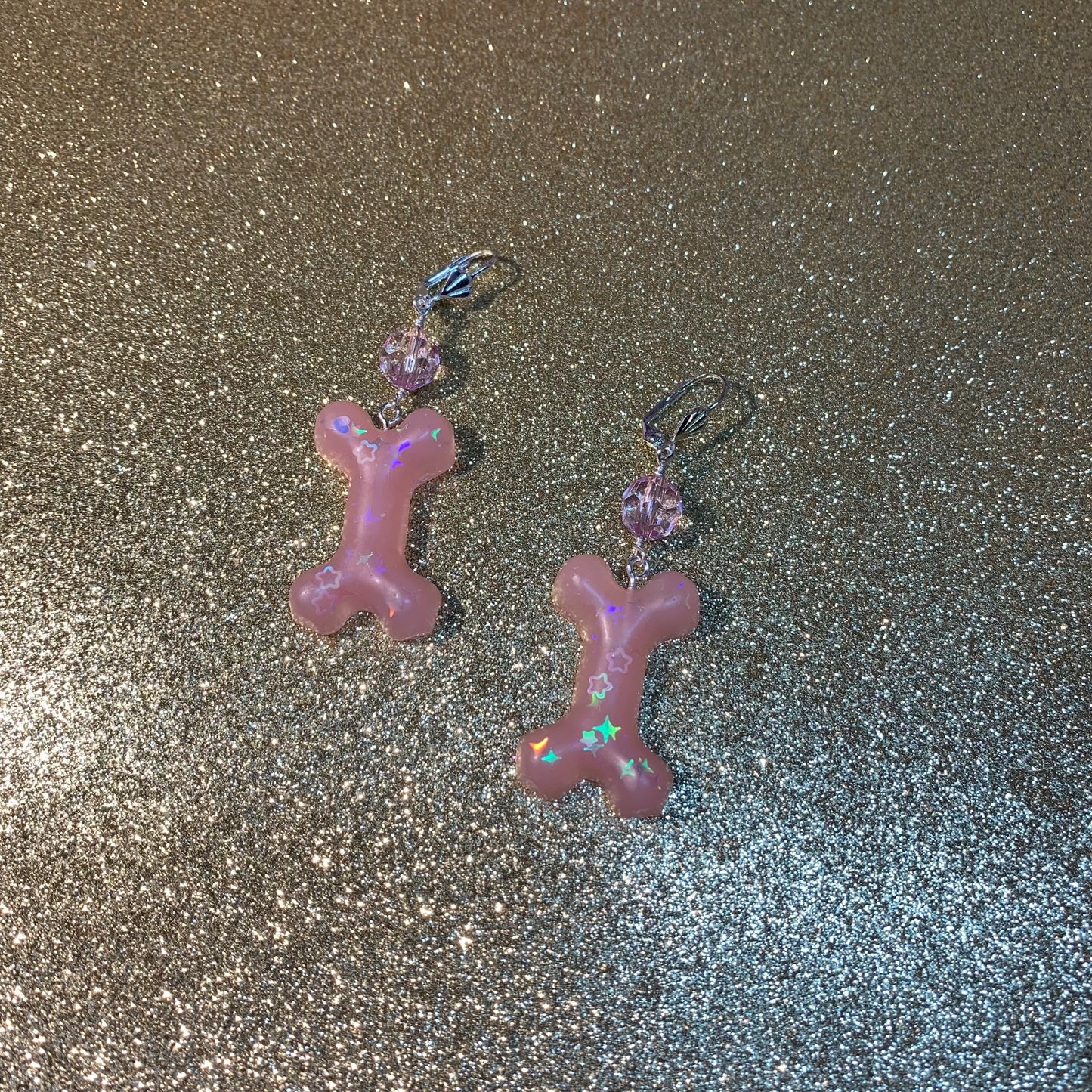 Pink dog bone earring