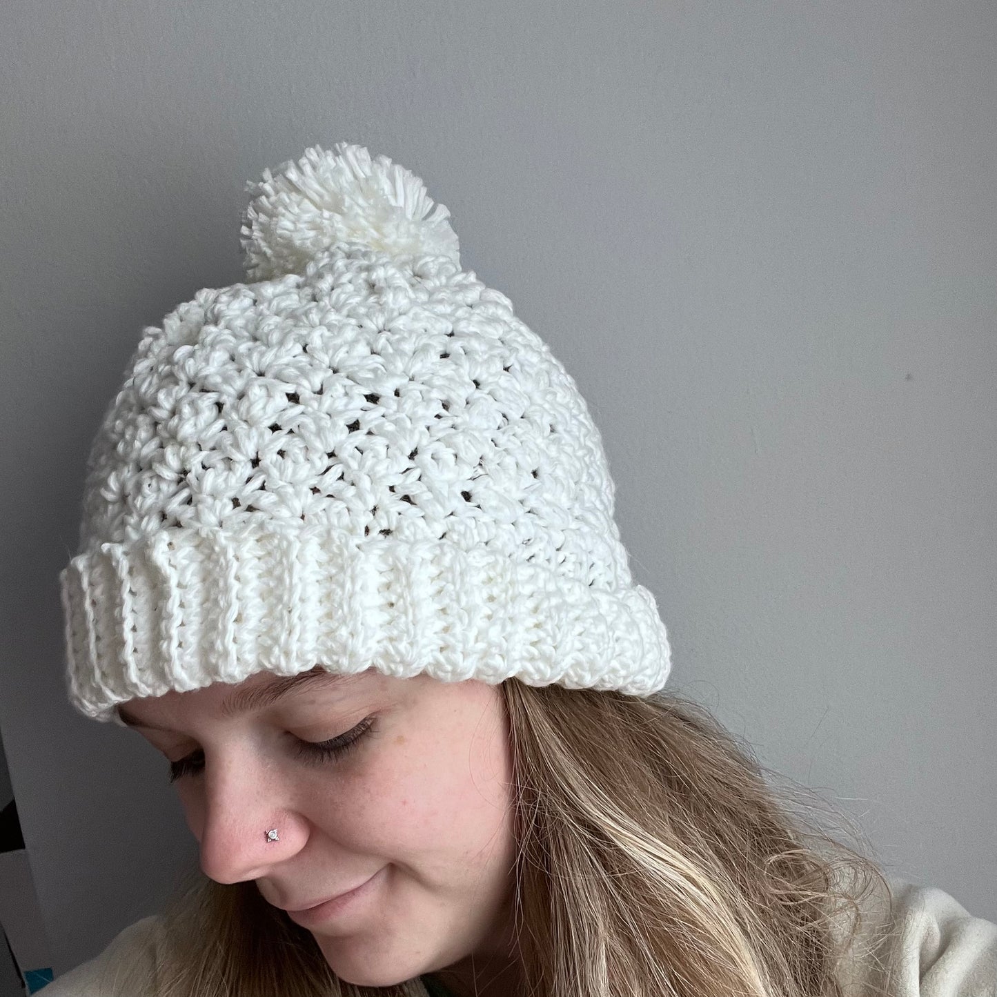 Crocheted white beanie