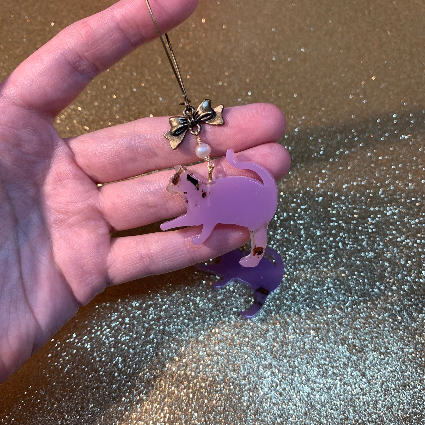 Purple tea cat earrings