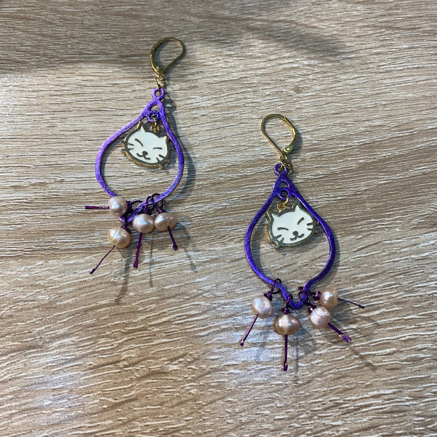 Purple cat earrings