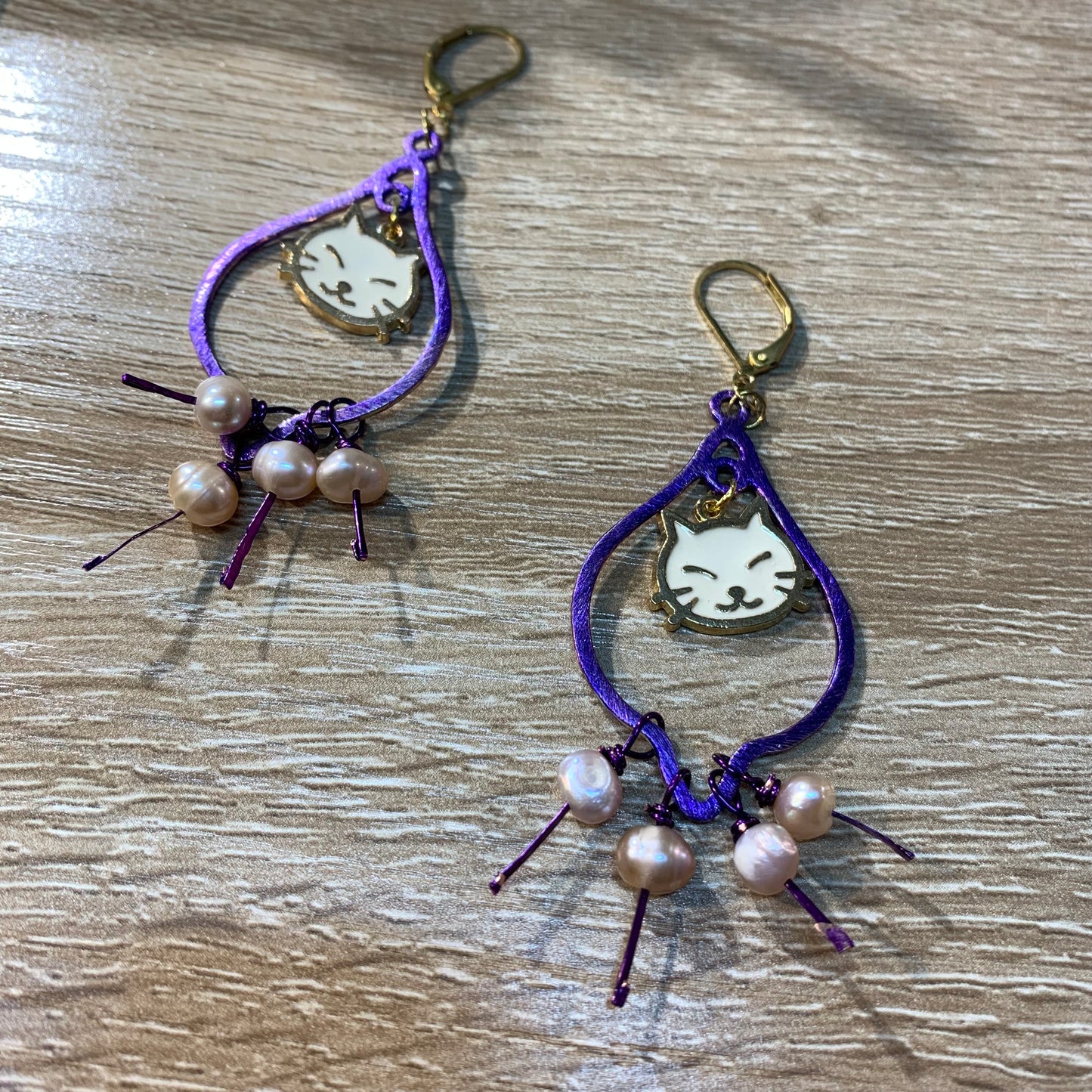 Purple cat earrings