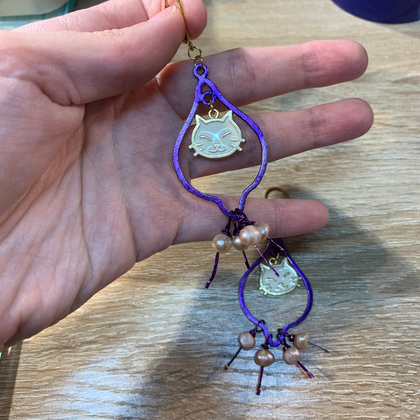 Purple cat earrings