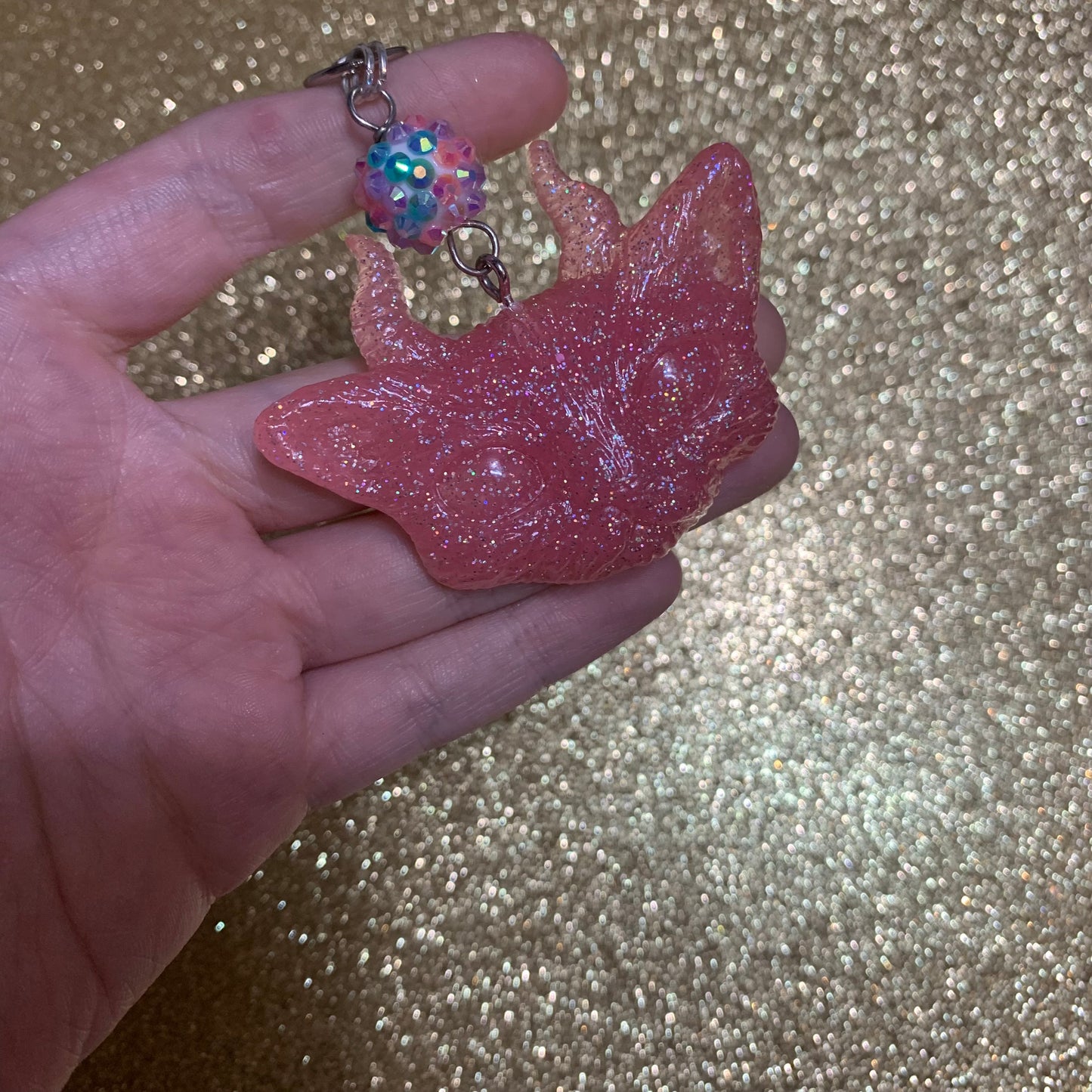 Pink holographic, which kitty keychain