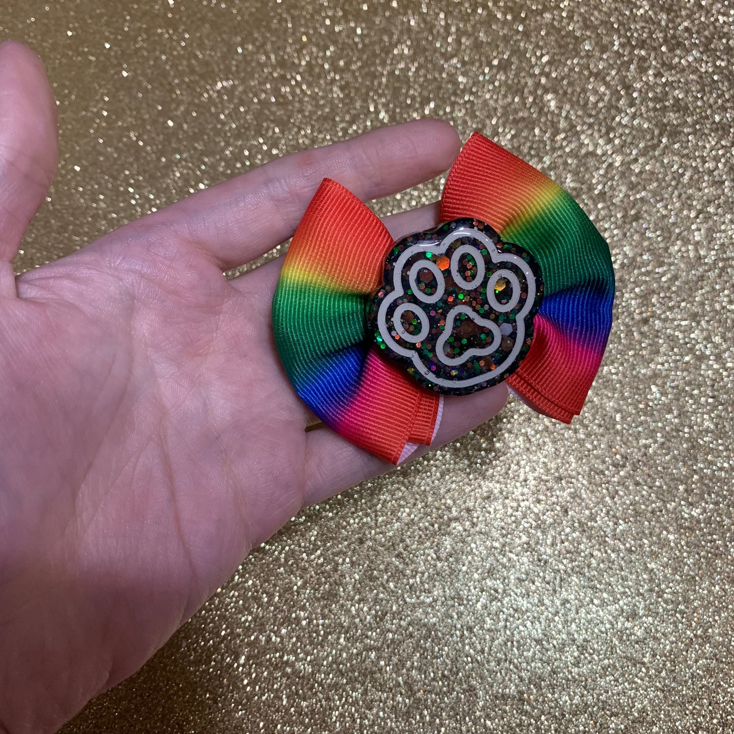 Paw print rainbow hair clip