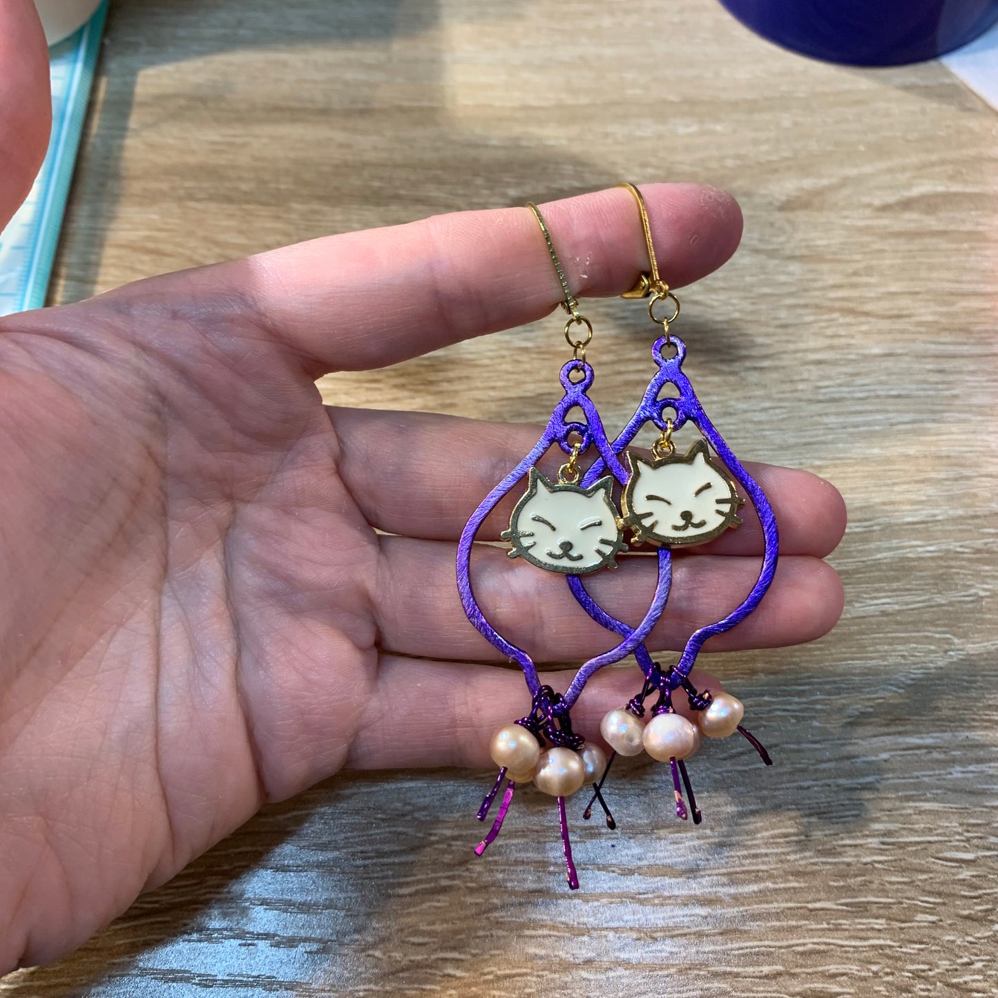 Purple cat earrings