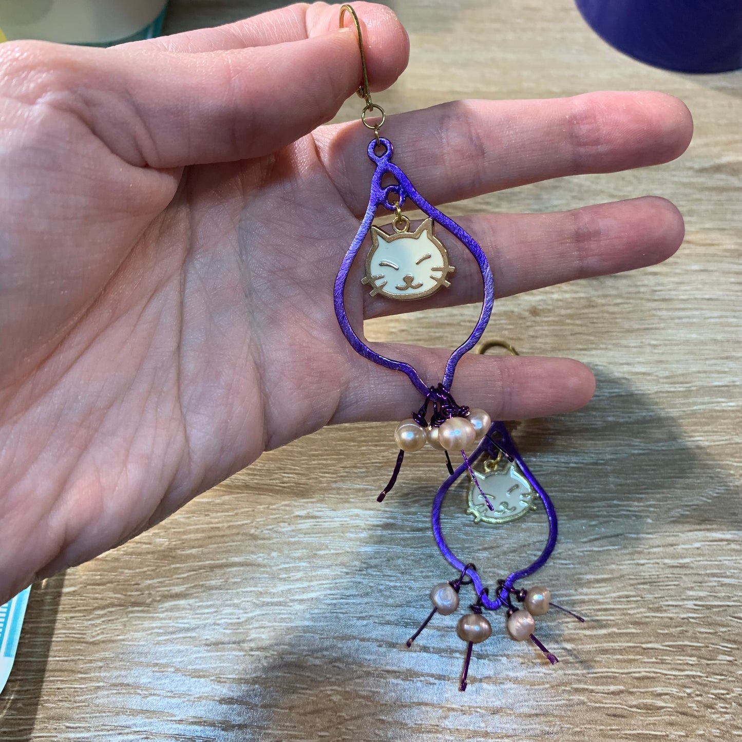 Purple cat earrings