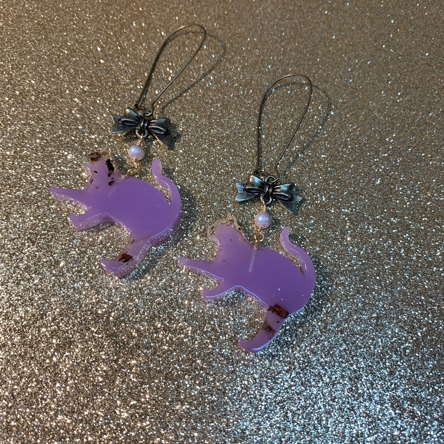 Purple tea cat earrings