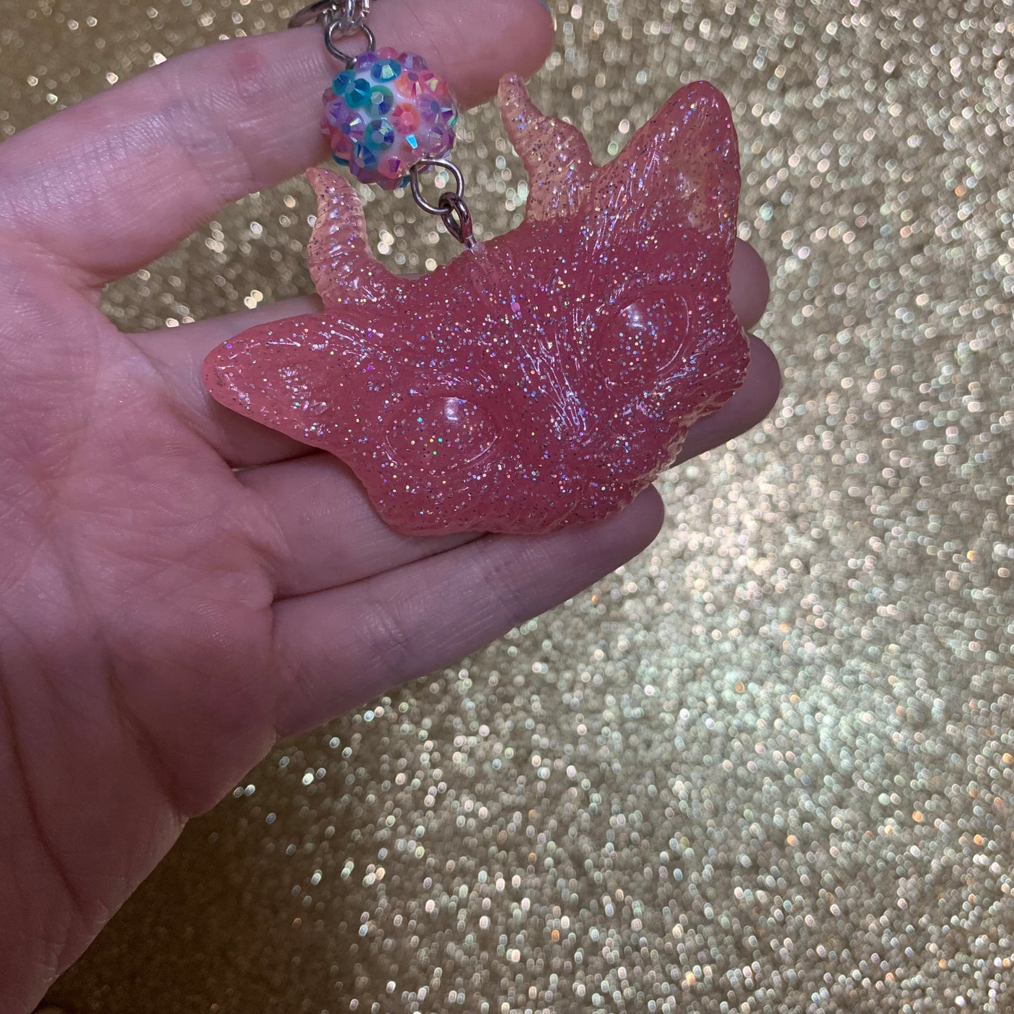 Pink holographic, which kitty keychain