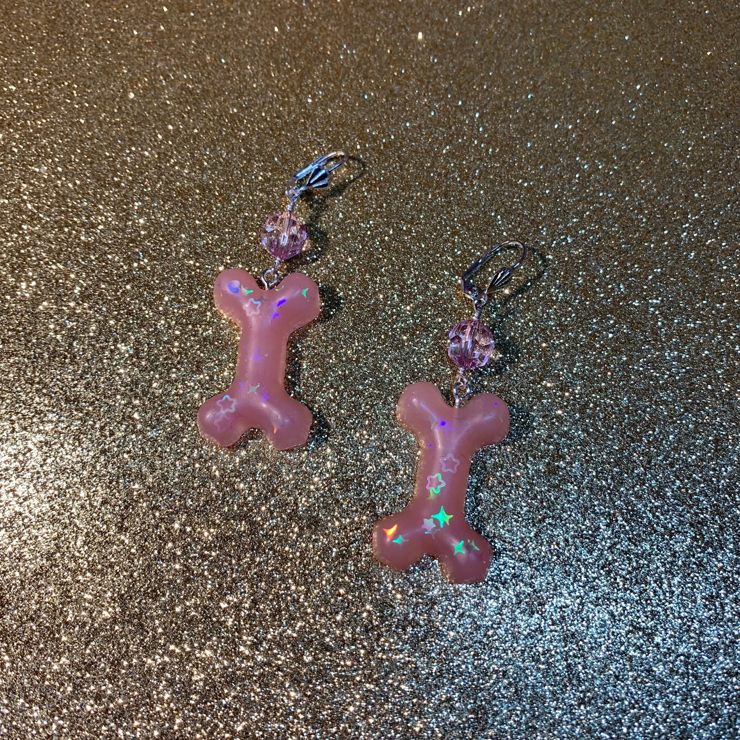 Pink dog bone earring