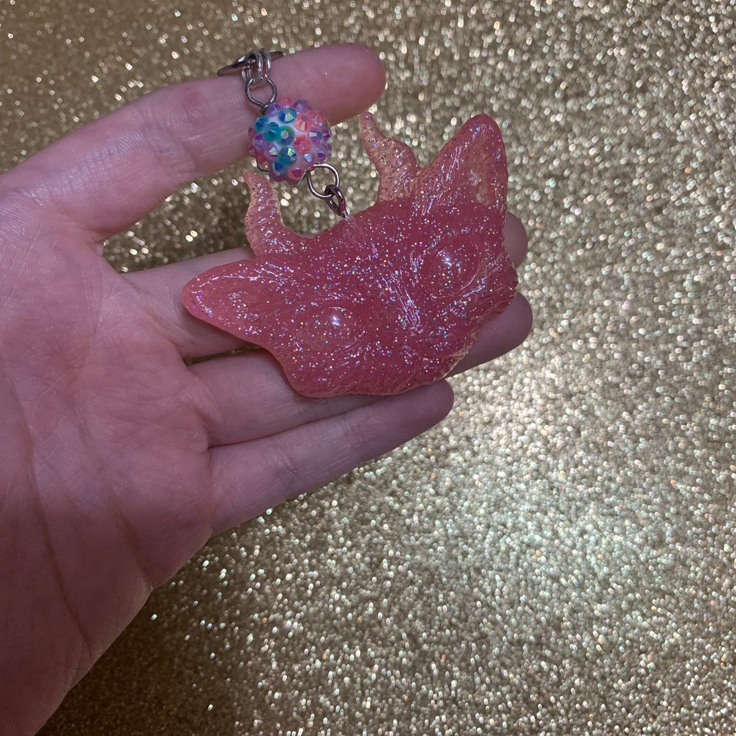 Pink holographic, which kitty keychain